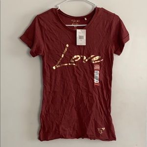 GUESS tee. New! Never worn. Small.